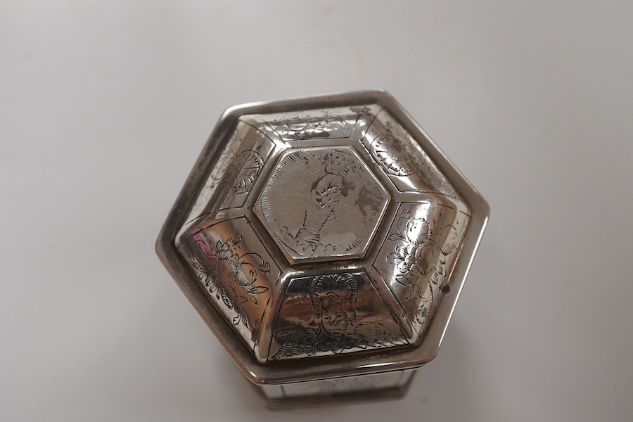 A late Victorian silver octagonal tea caddy, by Thomas Bradbury & Sons, London, 1895, 12.8cm and a Dutch? engraved white metal hexagonal silver marriage pot and cover, 8.3oz. Condition - poor to fair